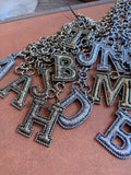 D, L, M, N, R, T avail: Signature Initial Tooled Necklace
