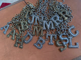 D, L, M, N, R, T avail: Signature Initial Tooled Necklace