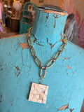 Golden Canvas Pendant Necklace by Jennifer Thames