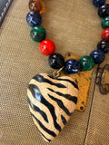 Moody Wild Zebra Heart Necklace by Jennifer Thames
