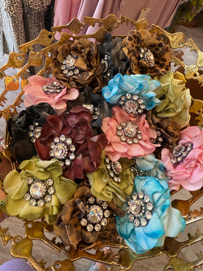 A Rare Bird Crystal Button Slide with Rosette