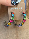 Side view of Accessories to Go multicolor crystal hoop earrings