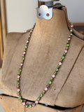 Long pink green and iridescent crystal necklace by Accessories to Go