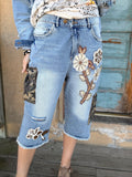 Hidden Trails Shorts by Jaded Gypsy with floral appliqués and camouflage cargo pockets