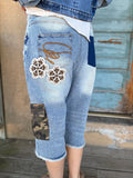 Hidden Trails Shorts by Jaded Gypsy with floral appliqués and camouflage cargo pockets