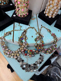 Jewel Box Crystal Collar Necklace shown in honey, multi, volcano AB, and black