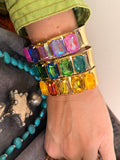 WAFA five rectangular crystal cuffs in pink purple, blue green, and golden amber