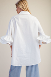 Back view of white double ruffle sleeve cotton poplin blouse